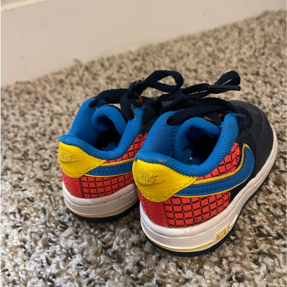 Nike infant shoes size 4C with blue swoosh and yellow trim, and red and black. - Picture 3 of 4